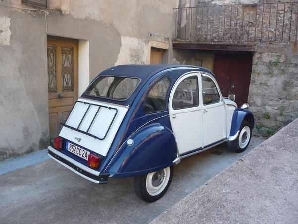 P1030665 We came across this when we were walking to dinner at the gite....a Citroen CV2 in perfect condition. If I lived in Corsica I would definitely have one of these...and eat goat cheese every day.