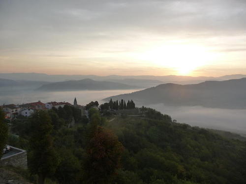 P1030887 The sunrise view from the wall that surrounds the village.