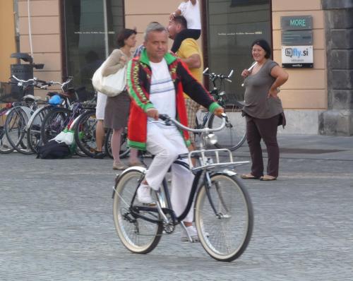 I like the rack....and the coat...and the white pants and the swooping dual top tube.   