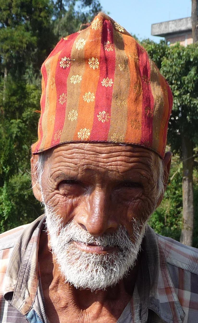 P1040567-2 This gentleman allowed me to take his picture on the way into Kalimpong. I love taking pictures of faces in India. Plenty of character.