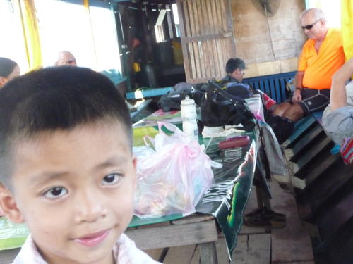 This is 5 year old Xay.  He was with us the whole way.  We gave him some books from Big Borther Mouse.