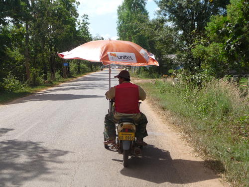 I drafted this guy on the way in.  He had a peanut cart on the front.  I couldn't believe how fast he was going with an umbrella  on top.  It never ripped off though.