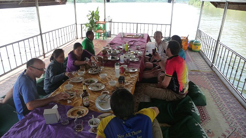 Floating restaurant....this tim efor lunch on the way to Vientiane.  We have been on a LOT of boats!